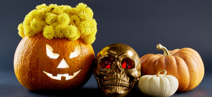 Still,Life,For,Halloween,With,A,Pumpkin,Lantern,Golden,Skull